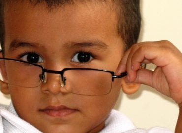 Little boy looking cool with glasses Visual Q Eyecare Melbourne